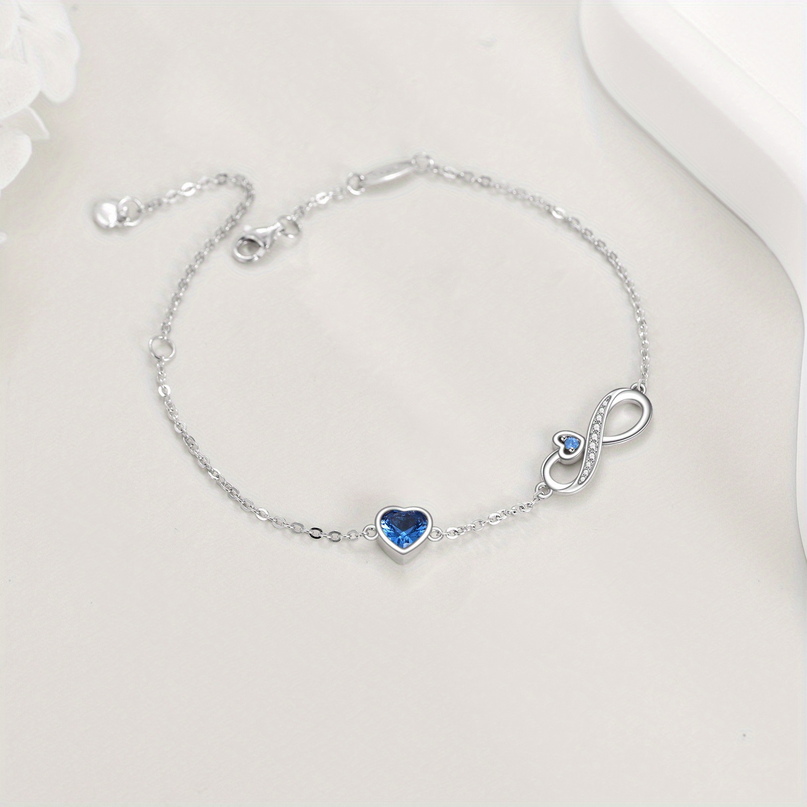 Sterling Silver Infinity Bracelet with Heart Charm